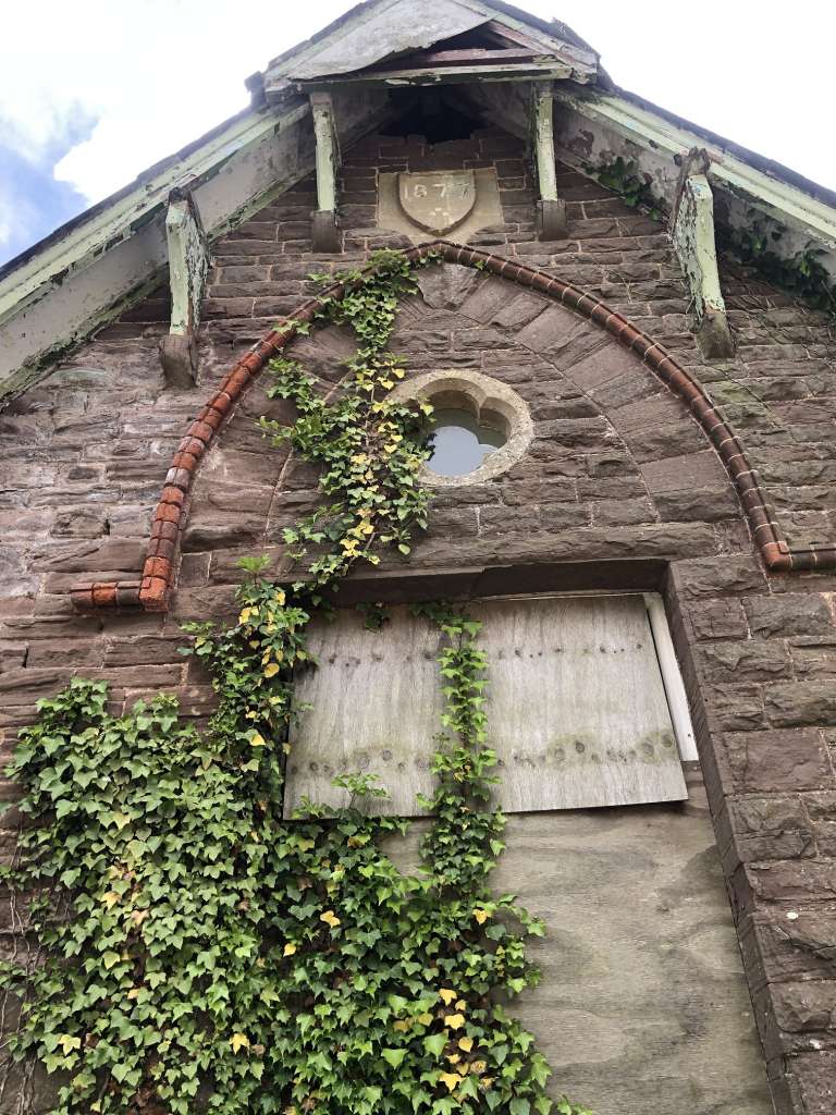 The 1877 school building retains a number of modest but distinctive architectural details